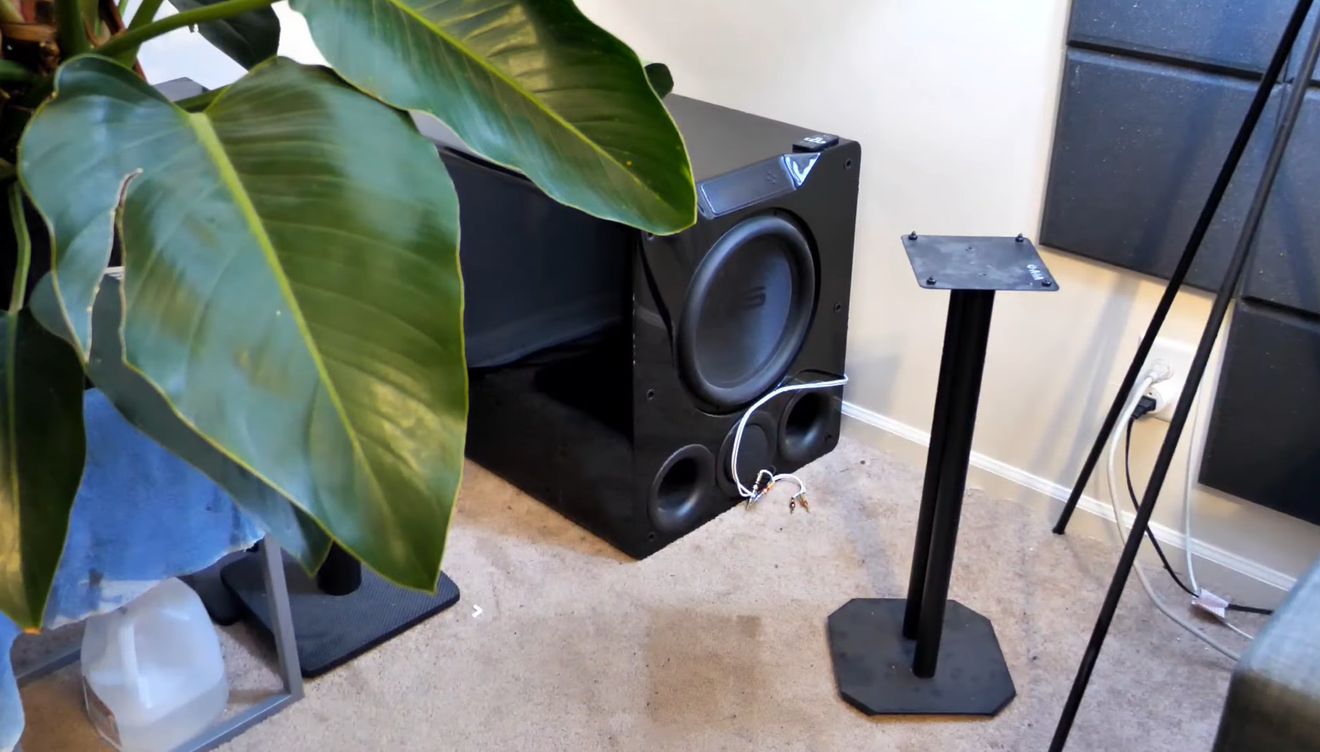 how to hide a subwoofer in a corner